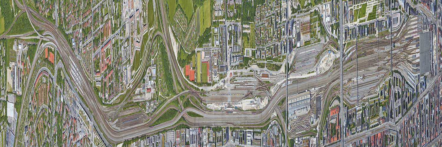 verzerrtes Luftbild der Münchner Bahnachse von westlich Pasing bis zum Hauptbahnhof, zusammengebastelt aus Google Earth 2023